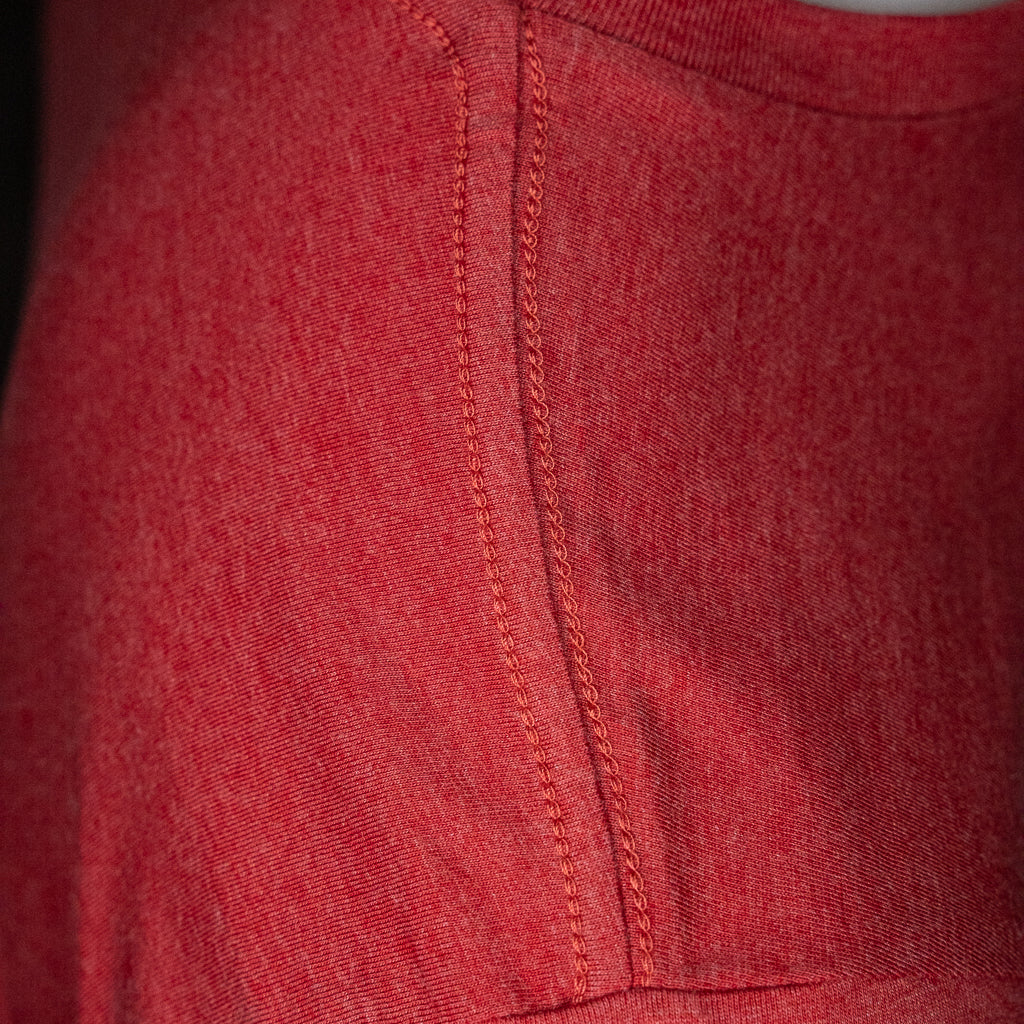 Close up of the high quality double stitching on a Level UP Toyota 2JZ engine diagram T-shirt in red