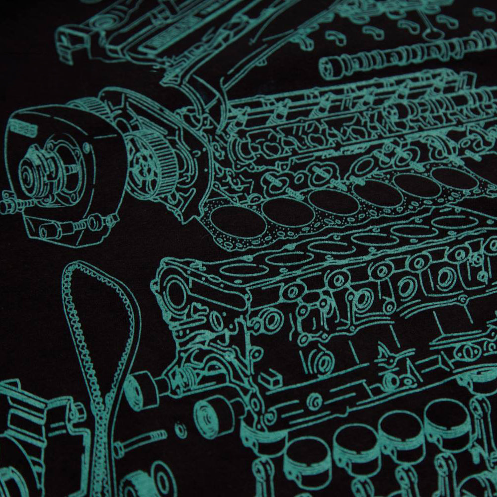 Close up of Level UP Nissan RB26 engine diagram T-shirt in black showing intricate line work of screen print art