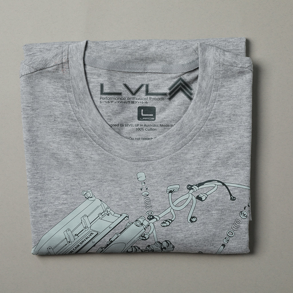 Level UP Nissan RB26 engine diagram T-shirt in grey folded and placed on a neutral background